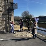 People flying hand crafted kestrel kites